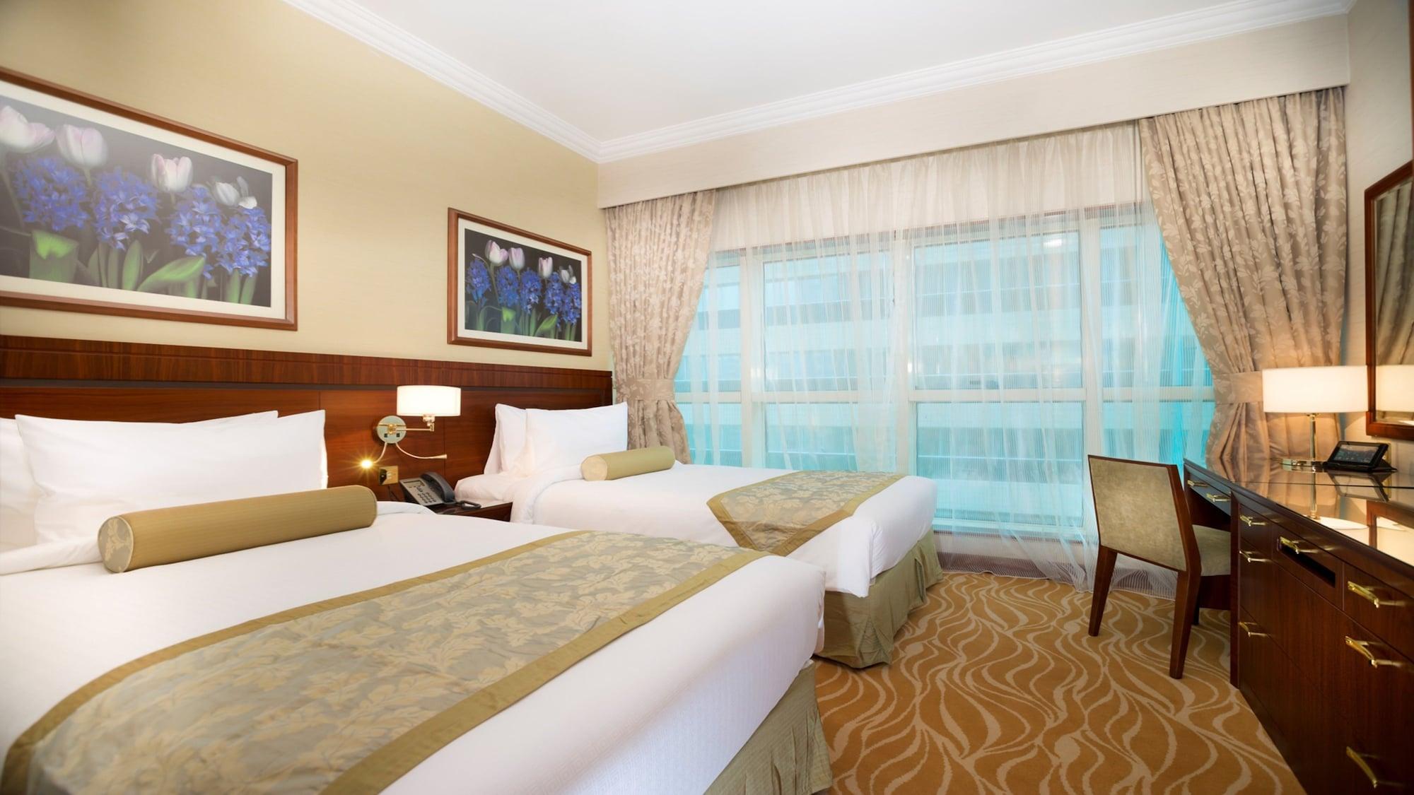 Grand Mercure Majlis Residences Abu Dhabi Exterior foto A room at the hotel