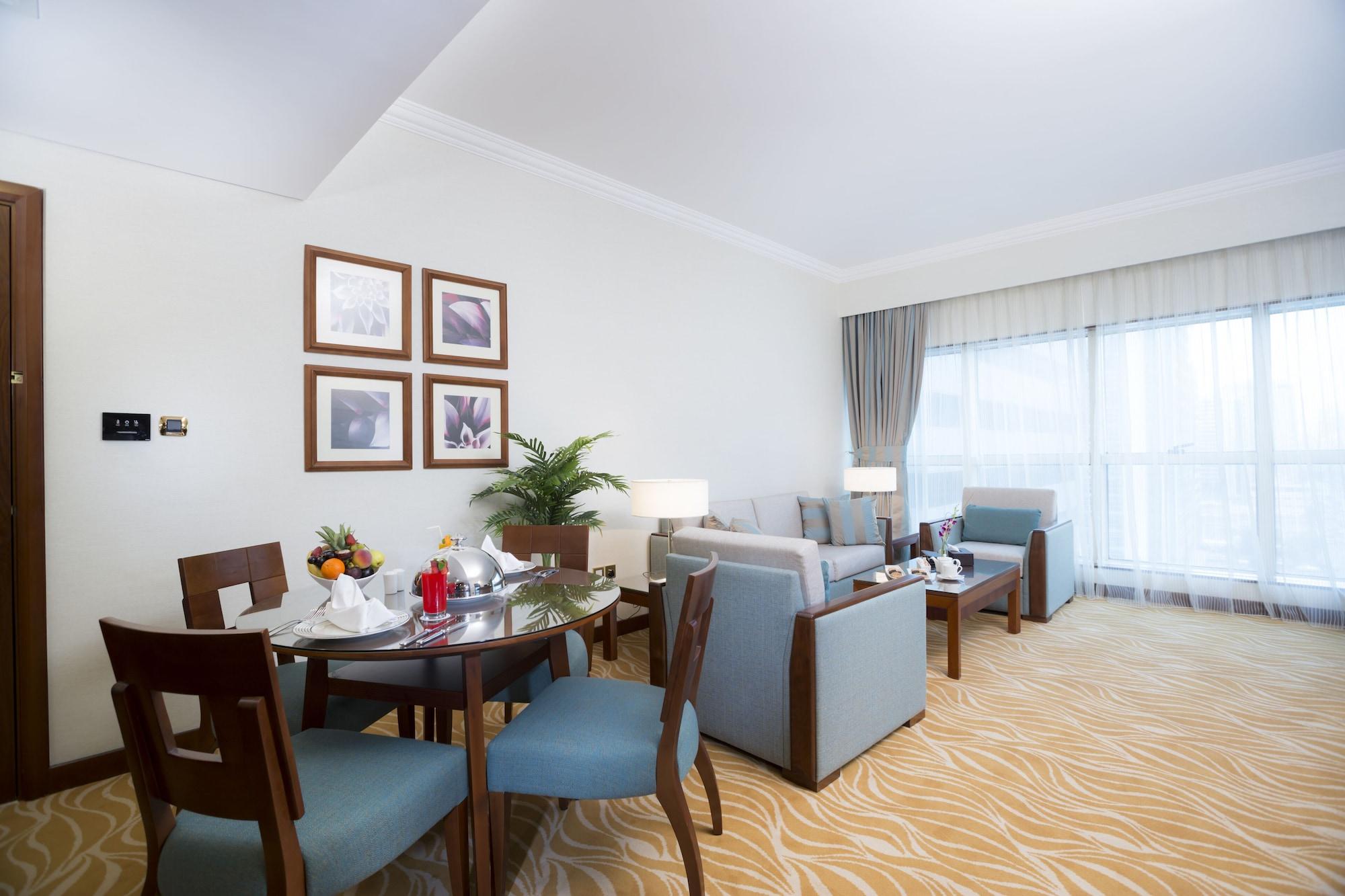 Grand Mercure Majlis Residences Abu Dhabi Exterior foto A living room at the hotel