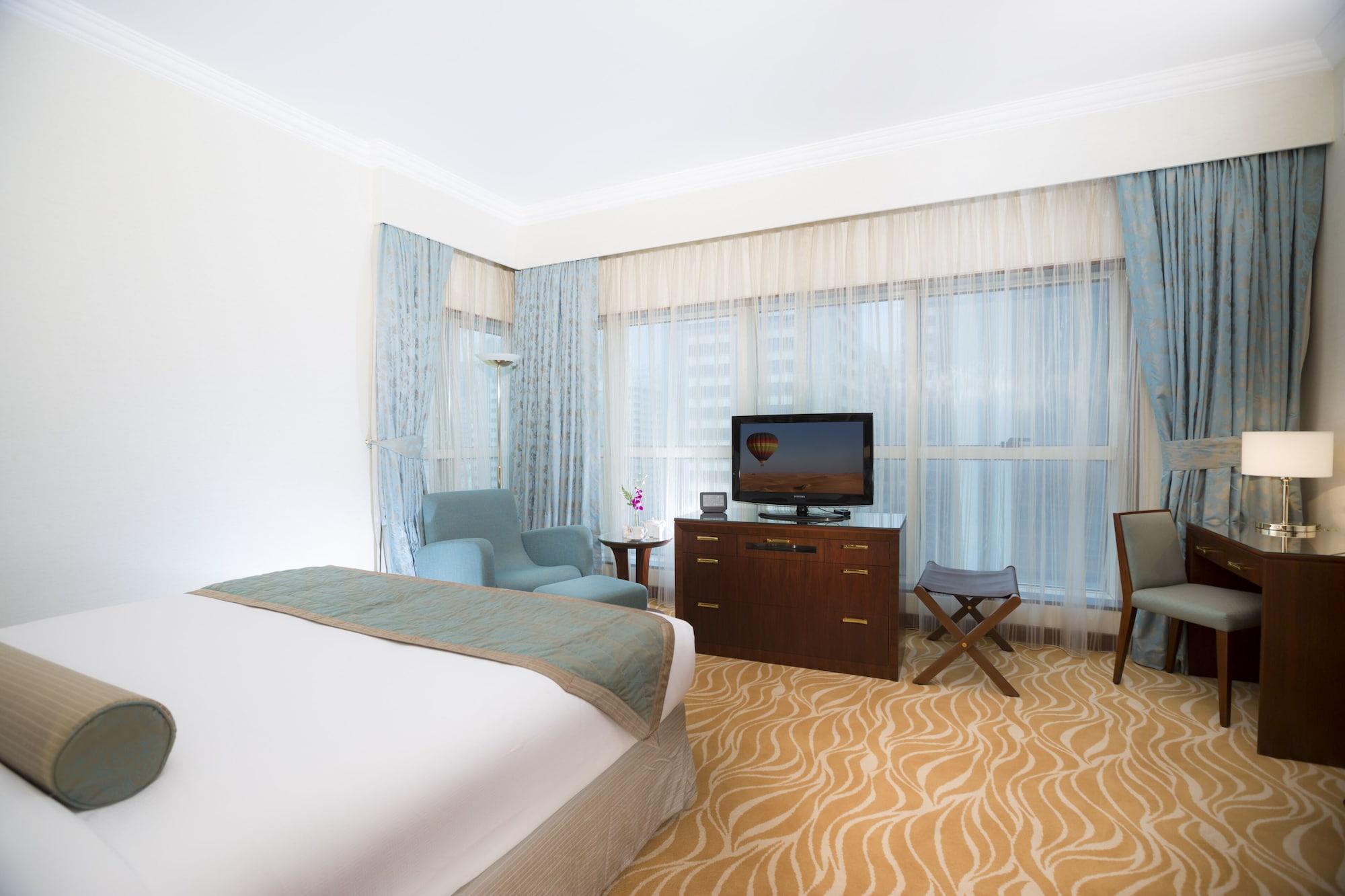 Grand Mercure Majlis Residences Abu Dhabi Exterior foto A room at the hotel