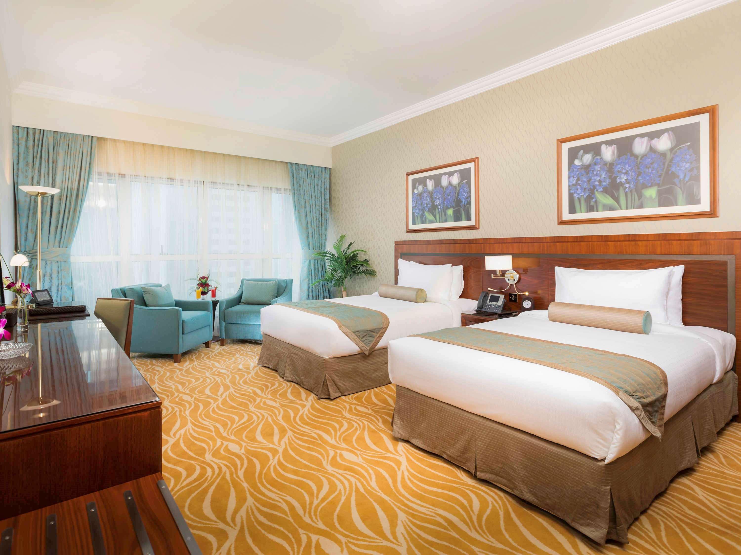 Grand Mercure Majlis Residences Abu Dhabi Exterior foto A room at the hotel
